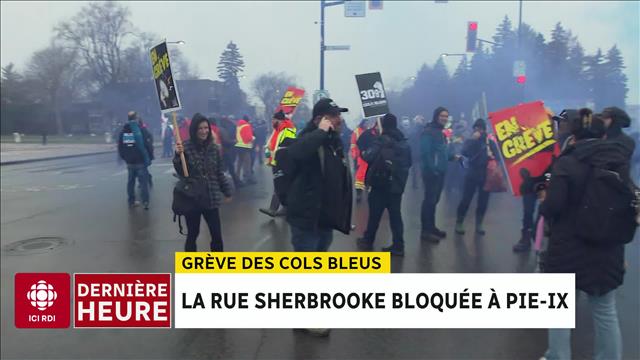 À Montréal, la rue Sherbrooke bloquée par les cols bleus en grève
